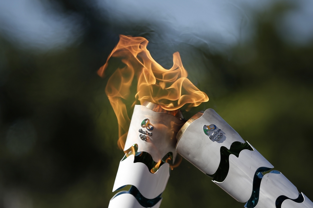 Fogo olímpico da chama da tocha dos jogos do esporte